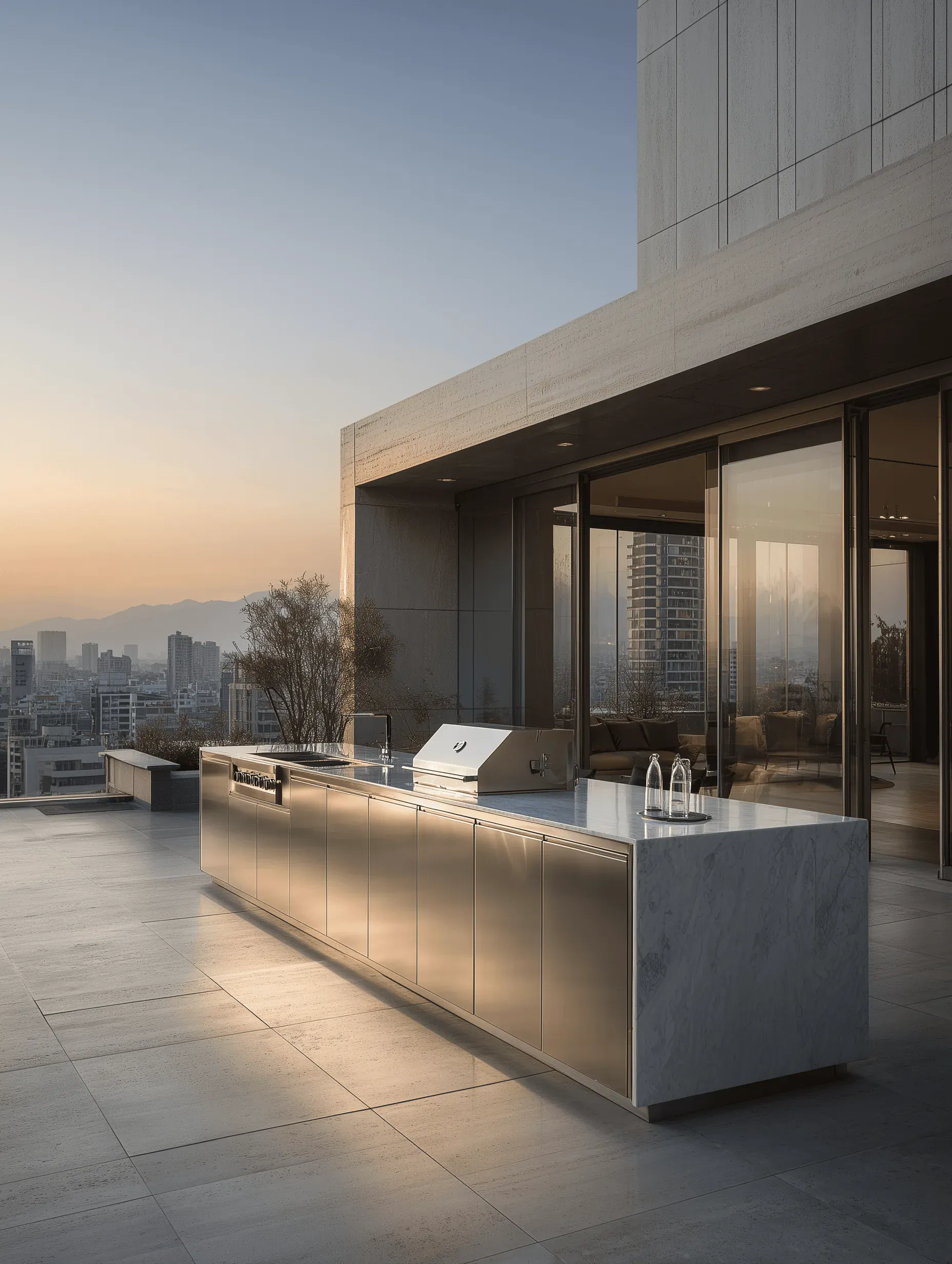 Stainless steel rooftop outdoor kitchen at sunset
