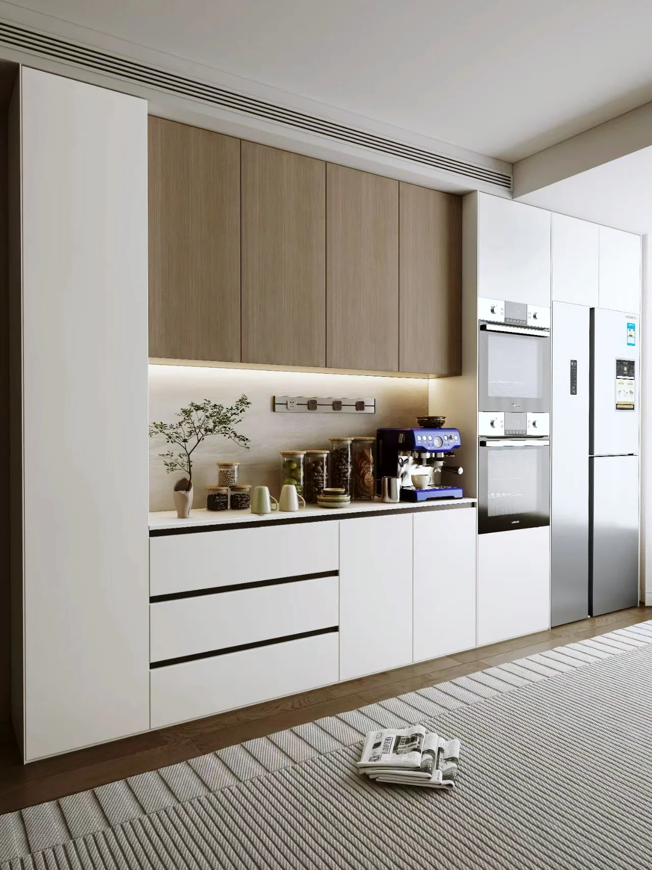 Pale dining storage wall with wood upper cabinets, a coffee niche and integrated tall appliances