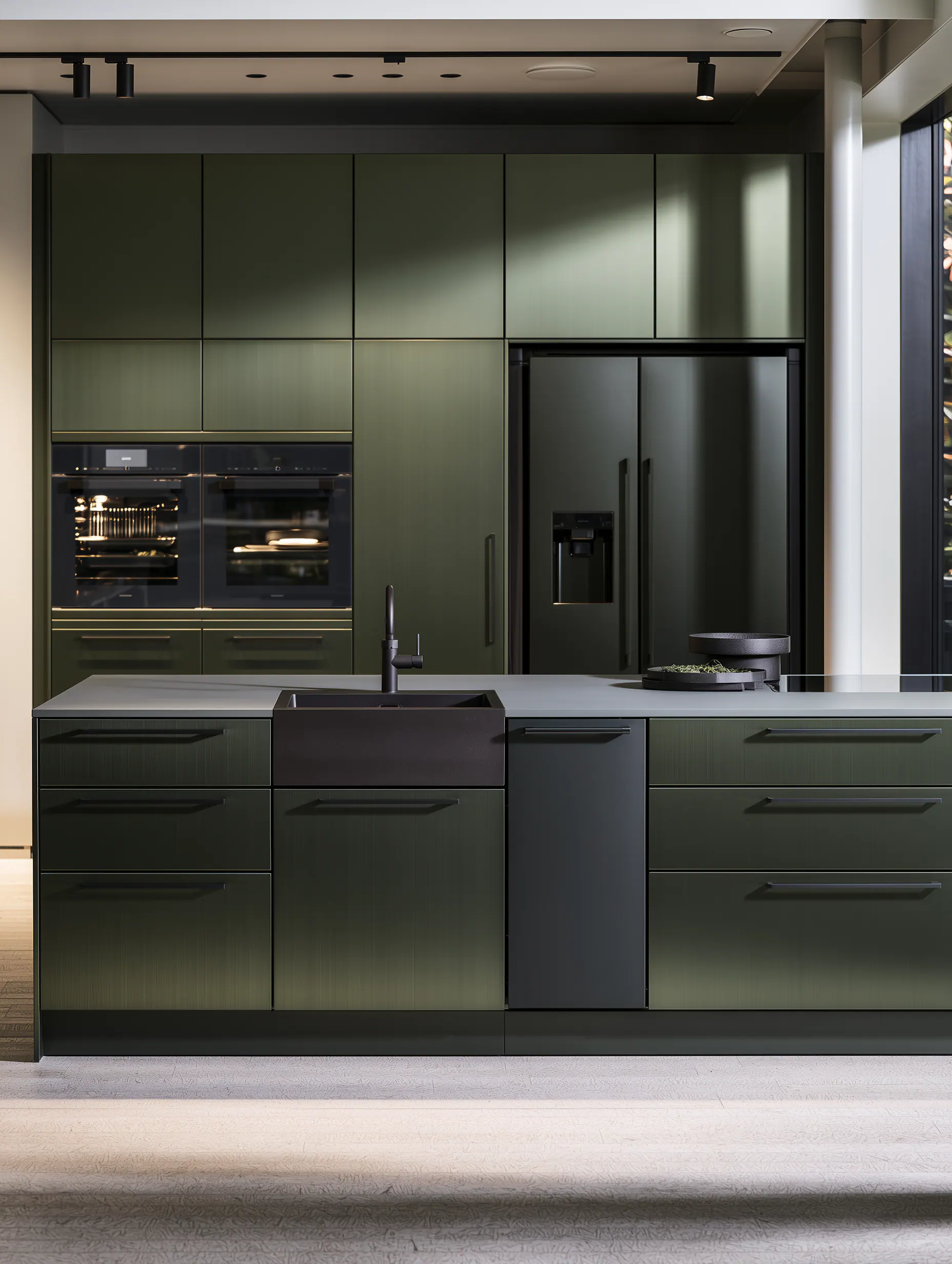 Graphite aluminum cabinet wall and island composed as a precise frontal kitchen elevation