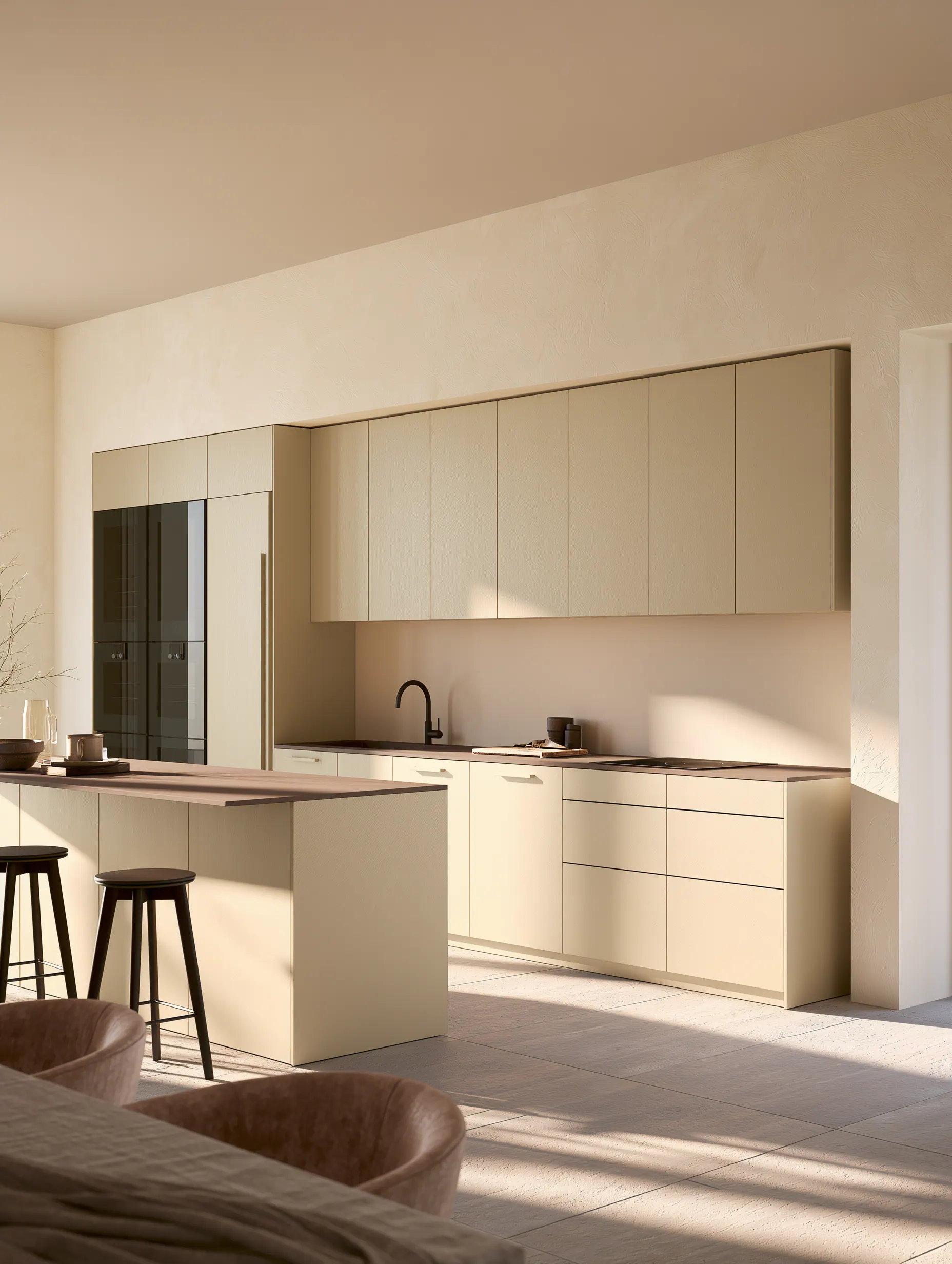 Sunlit cream aluminum kitchen with an island, wall cabinets and open dining connection